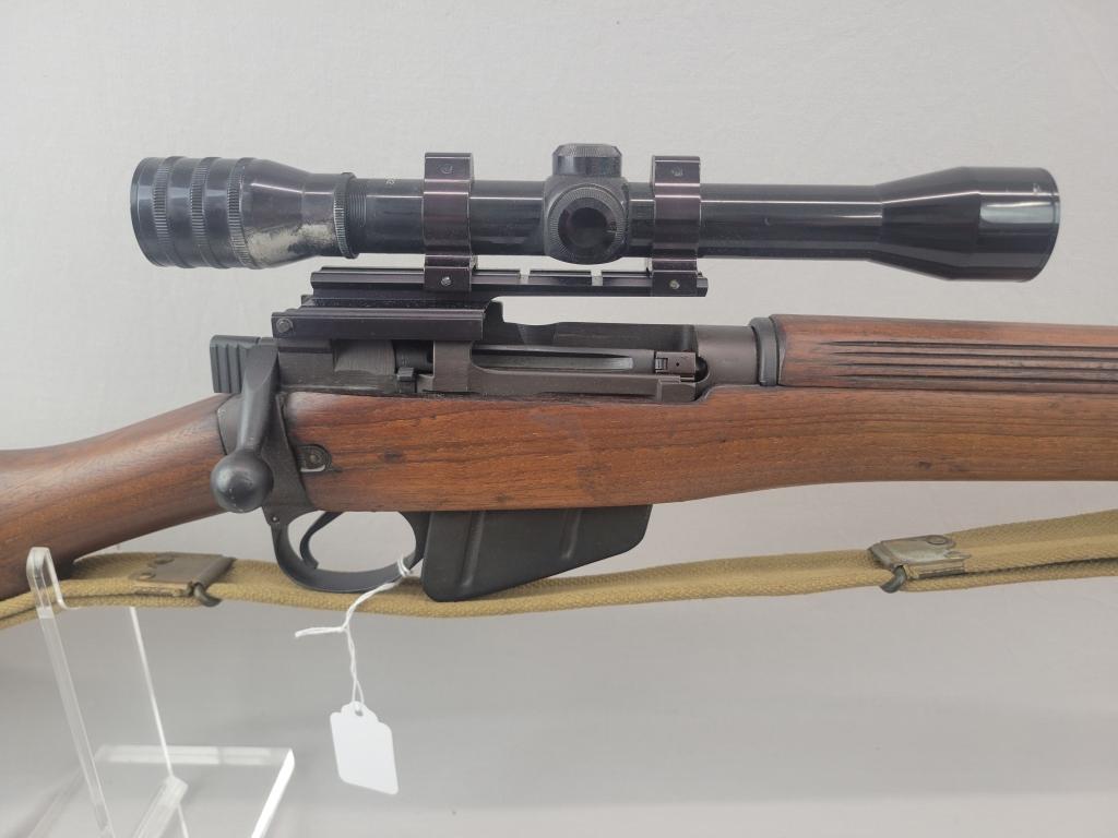 Enfield Rifle Enfield rifle, unknown manufacturer, chambered in .303. Wooden stock and blued barrel