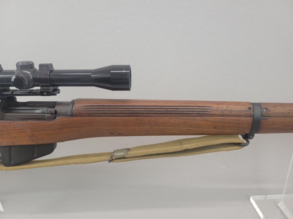 Enfield Rifle Enfield rifle, unknown manufacturer, chambered in .303. Wooden stock and blued barrel