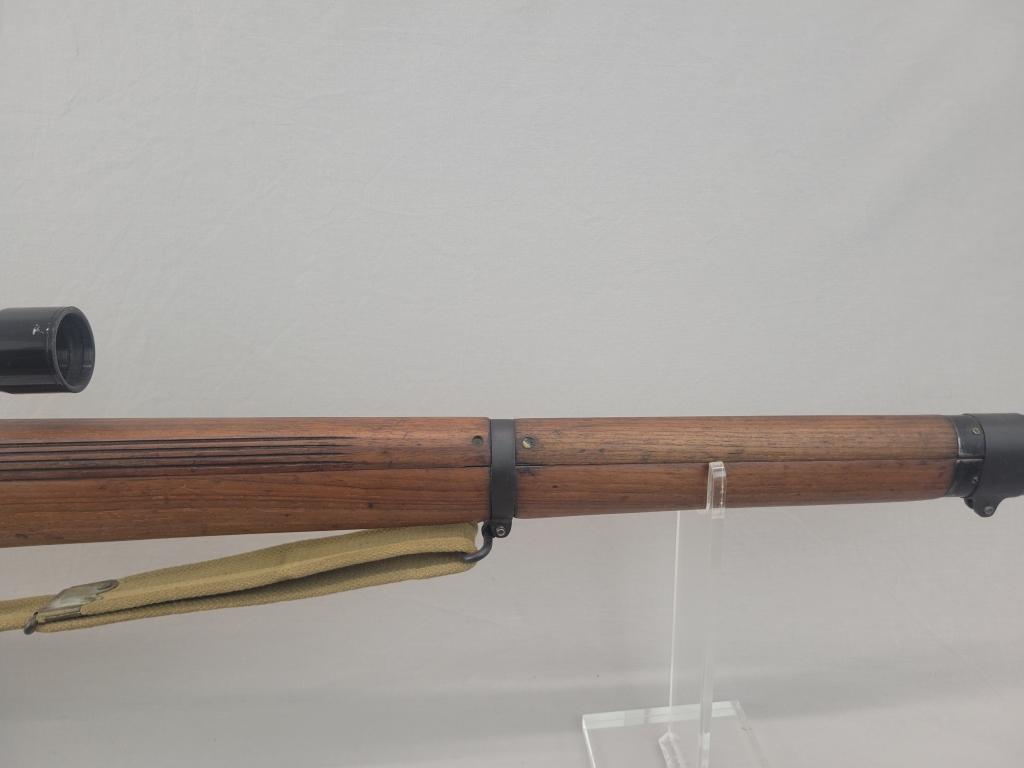 Enfield Rifle Enfield rifle, unknown manufacturer, chambered in .303. Wooden stock and blued barrel
