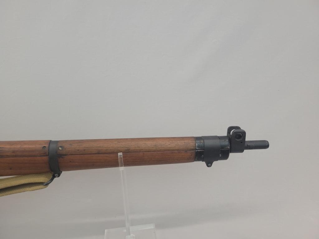Enfield Rifle Enfield rifle, unknown manufacturer, chambered in .303. Wooden stock and blued barrel