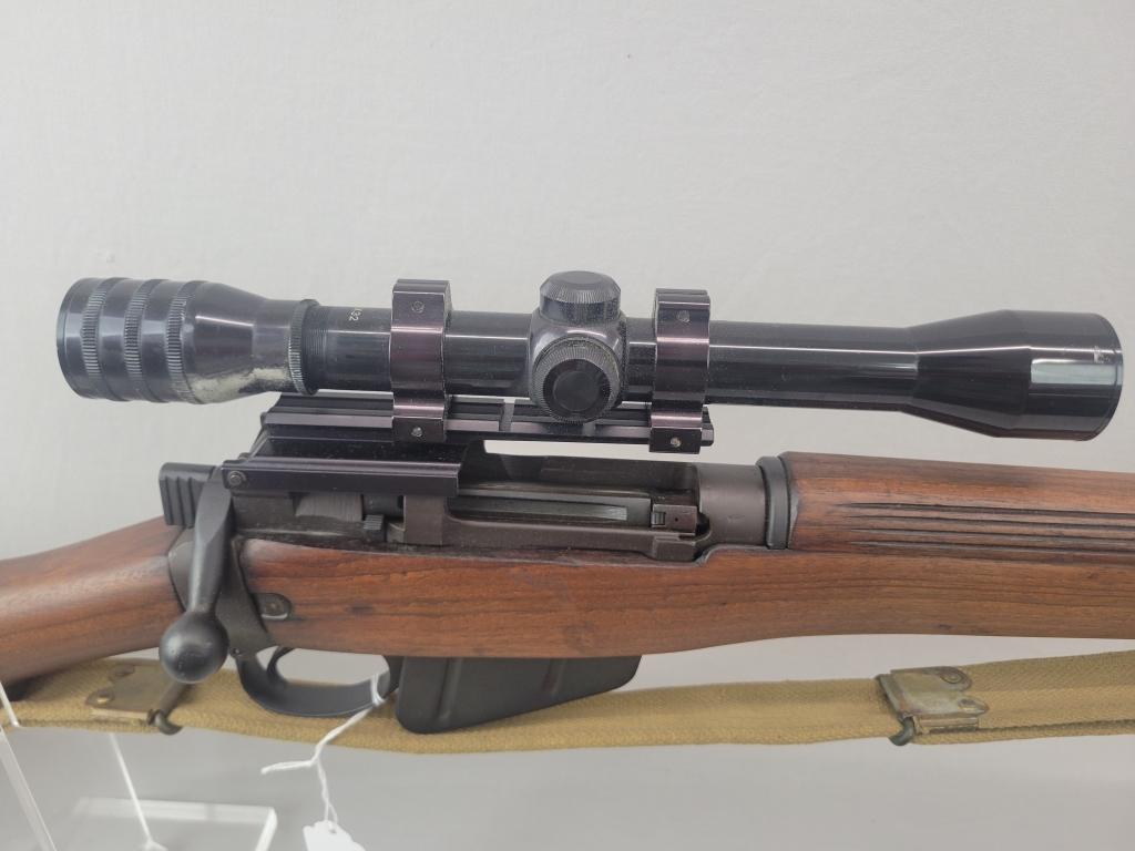 Enfield Rifle Enfield rifle, unknown manufacturer, chambered in .303. Wooden stock and blued barrel