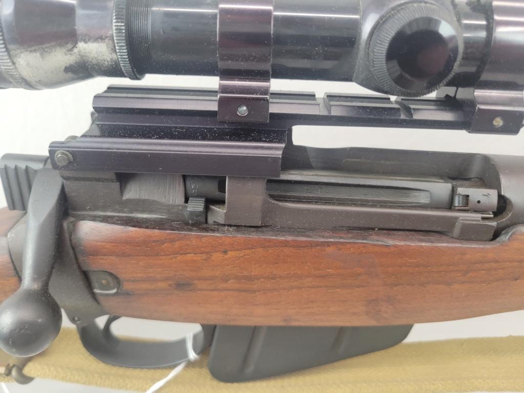 Enfield Rifle Enfield rifle, unknown manufacturer, chambered in .303. Wooden stock and blued barrel