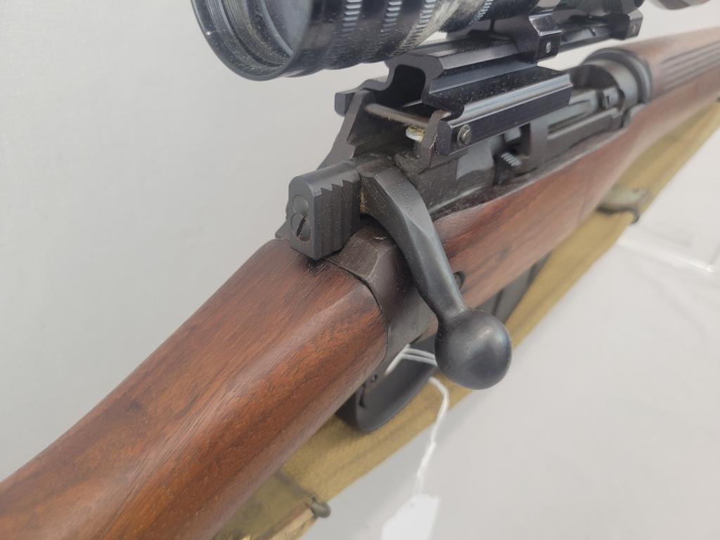 Enfield Rifle Enfield rifle, unknown manufacturer, chambered in .303. Wooden stock and blued barrel