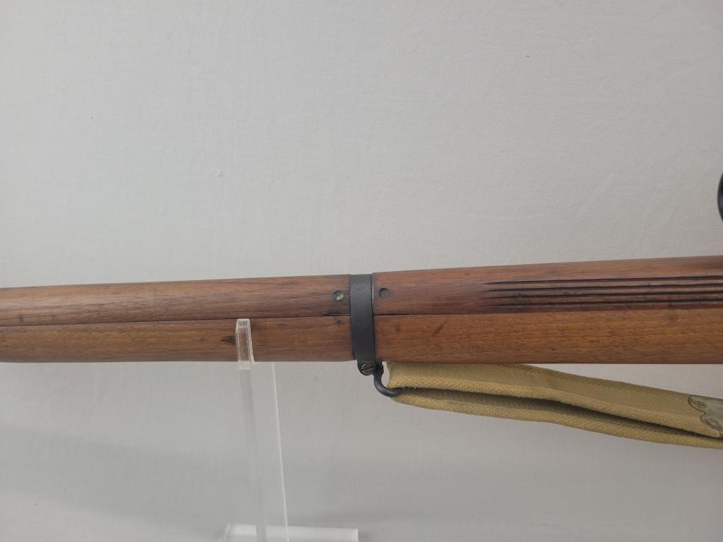 Enfield Rifle Enfield rifle, unknown manufacturer, chambered in .303. Wooden stock and blued barrel