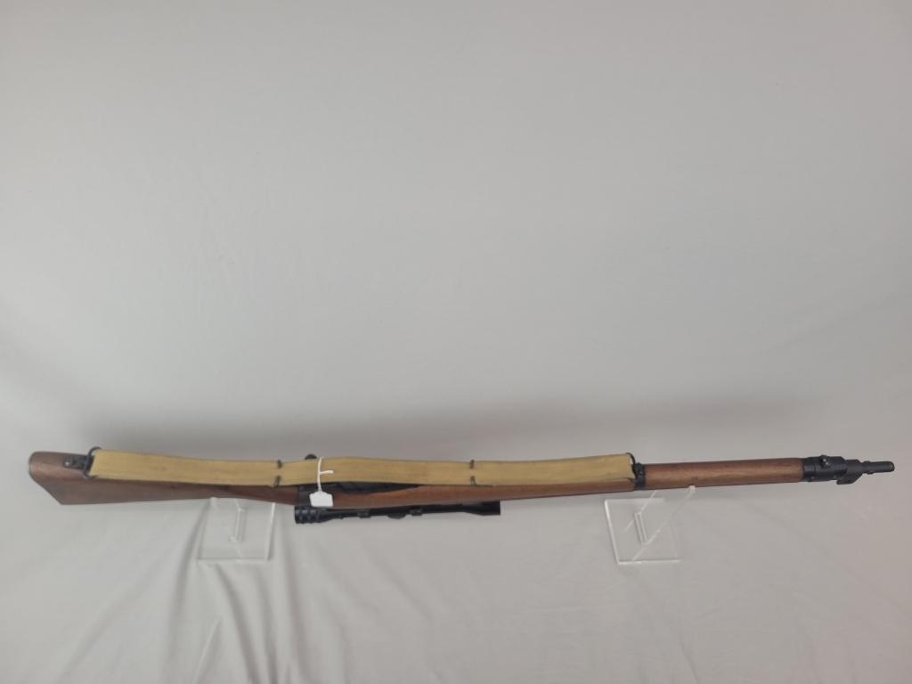 Enfield Rifle Enfield rifle, unknown manufacturer, chambered in .303. Wooden stock and blued barrel