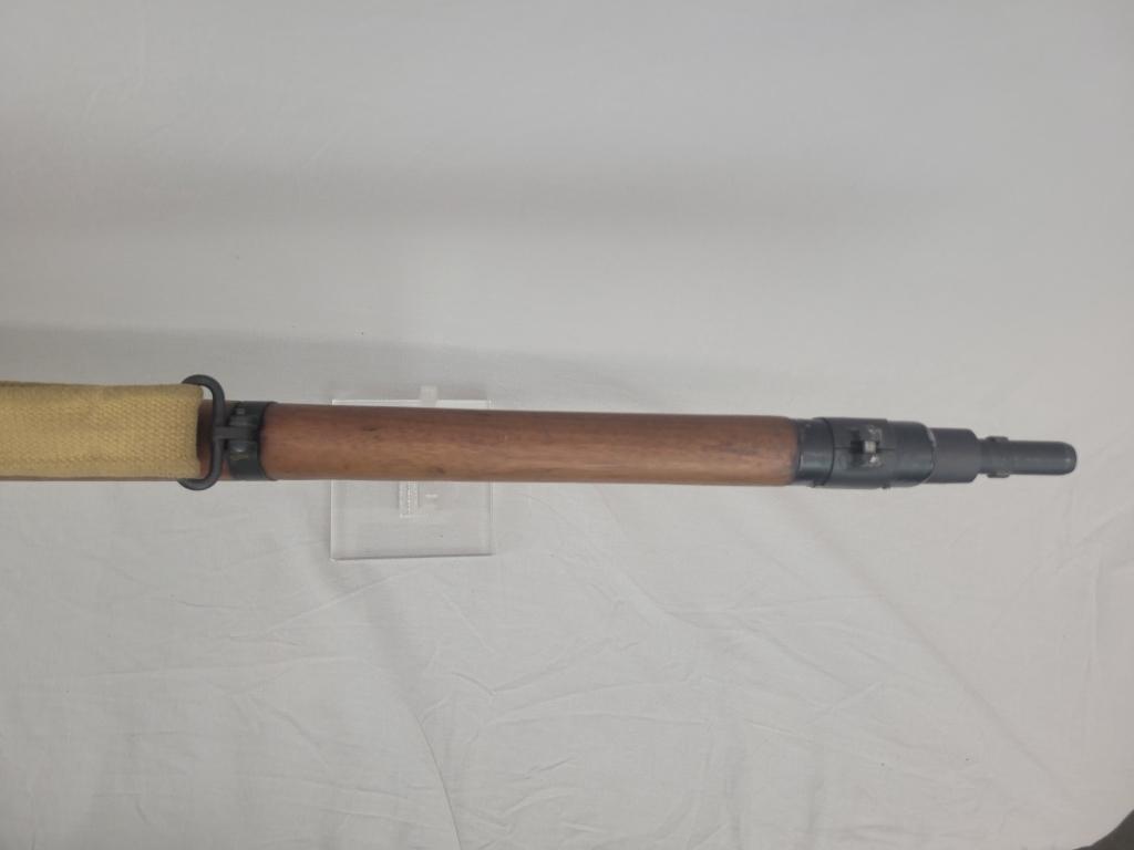 Enfield Rifle Enfield rifle, unknown manufacturer, chambered in .303. Wooden stock and blued barrel
