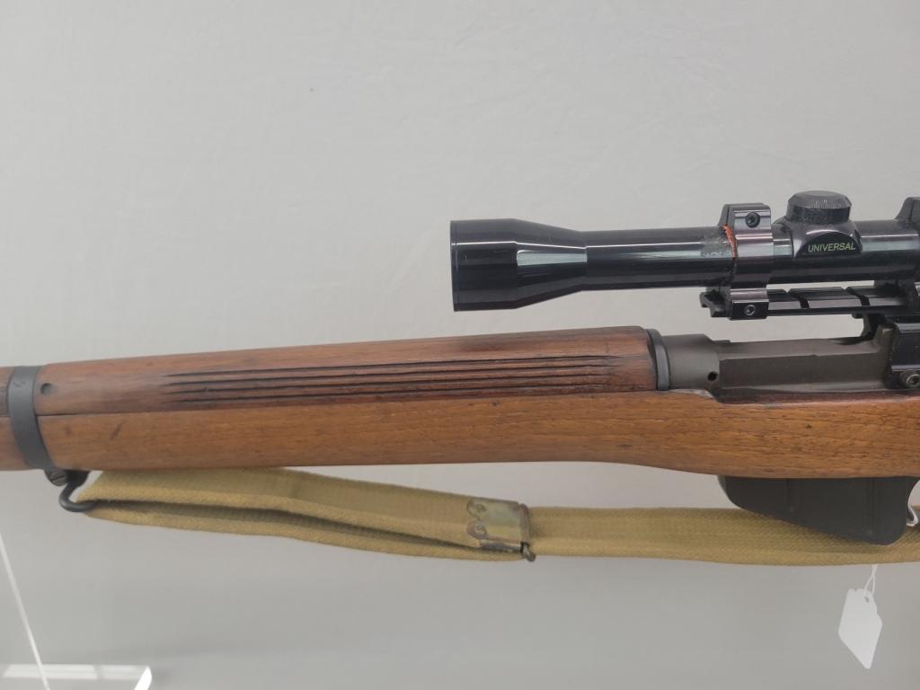 Enfield Rifle Enfield rifle, unknown manufacturer, chambered in .303. Wooden stock and blued barrel