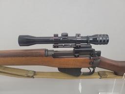 Enfield Rifle Enfield rifle, unknown manufacturer, chambered in .303. Wooden stock and blued barrel