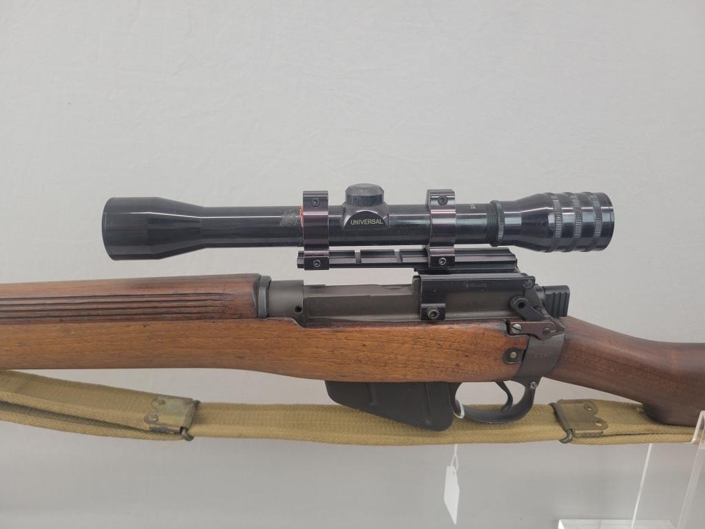 Enfield Rifle Enfield rifle, unknown manufacturer, chambered in .303. Wooden stock and blued barrel