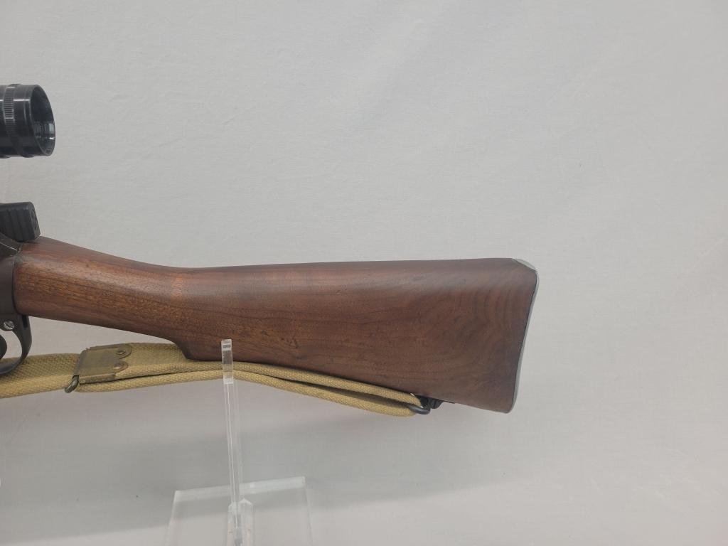 Enfield Rifle Enfield rifle, unknown manufacturer, chambered in .303. Wooden stock and blued barrel