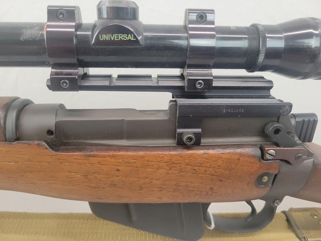 Enfield Rifle Enfield rifle, unknown manufacturer, chambered in .303. Wooden stock and blued barrel