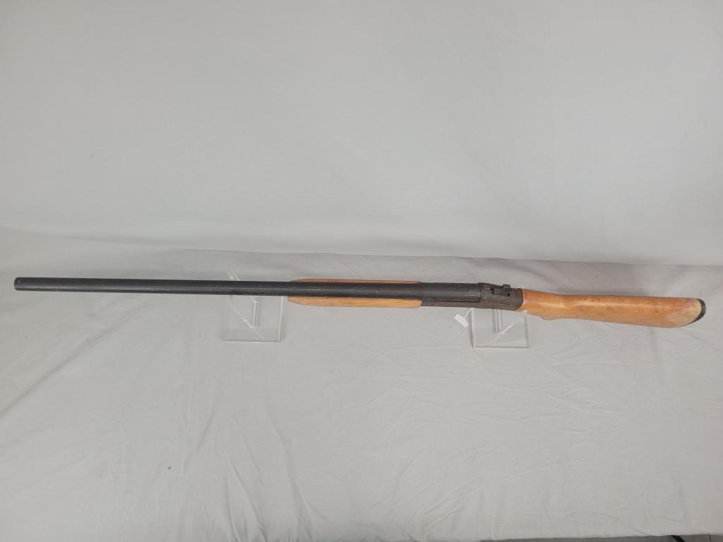 H&R Topper Shotgun H&R Topper single shot shotgun, chambered in 12 ga, wooden stock and blued barrel