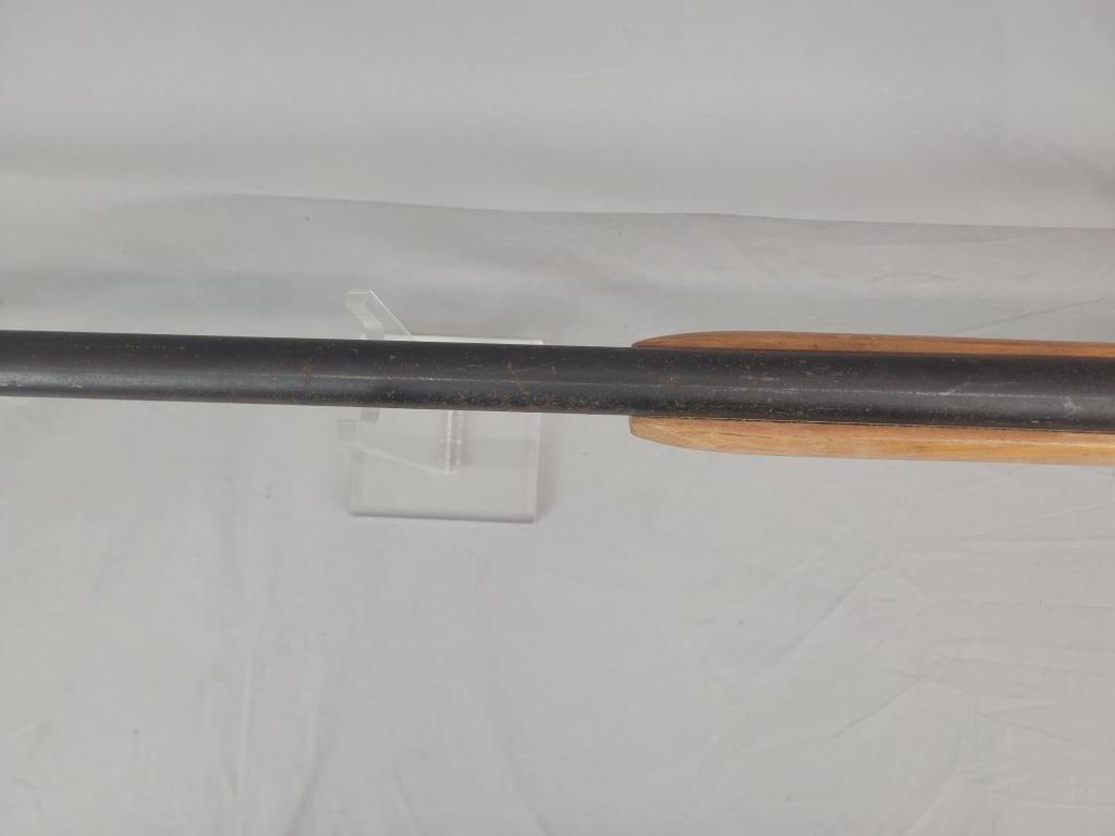 H&R Topper Shotgun H&R Topper single shot shotgun, chambered in 12 ga, wooden stock and blued barrel