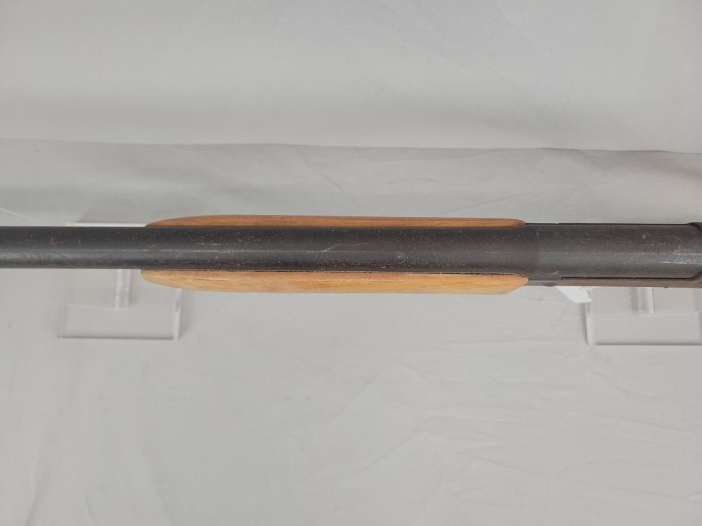 H&R Topper Shotgun H&R Topper single shot shotgun, chambered in 12 ga, wooden stock and blued barrel