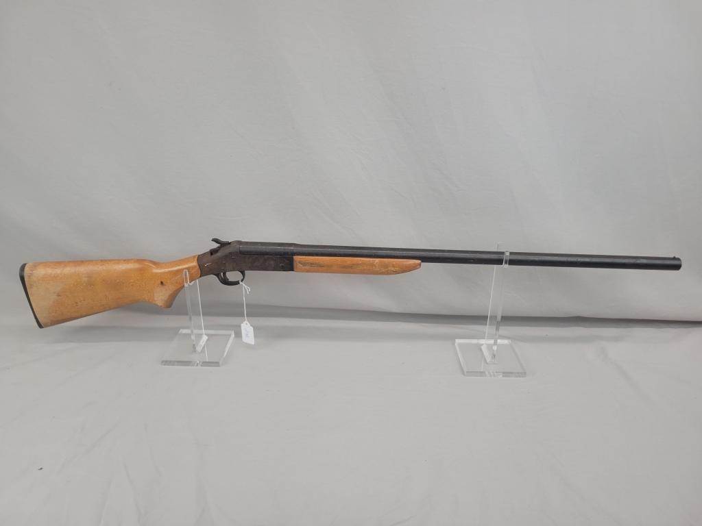H&R Topper Shotgun H&R Topper single shot shotgun, chambered in 12 ga, wooden stock and blued barrel