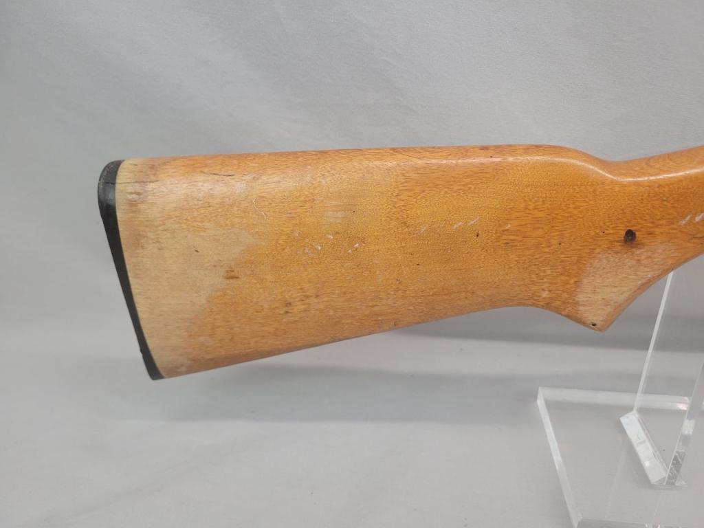 H&R Topper Shotgun H&R Topper single shot shotgun, chambered in 12 ga, wooden stock and blued barrel