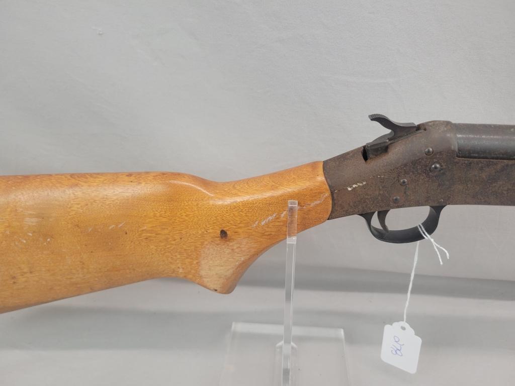 H&R Topper Shotgun H&R Topper single shot shotgun, chambered in 12 ga, wooden stock and blued barrel