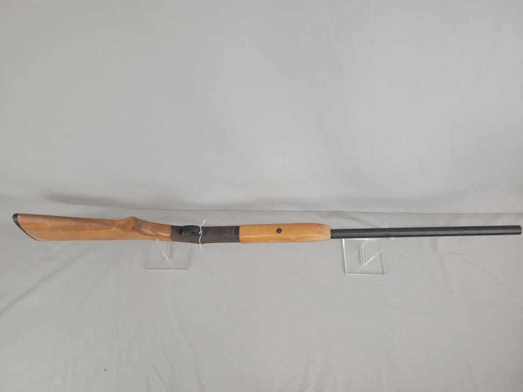 H&R Topper Shotgun H&R Topper single shot shotgun, chambered in 12 ga, wooden stock and blued barrel