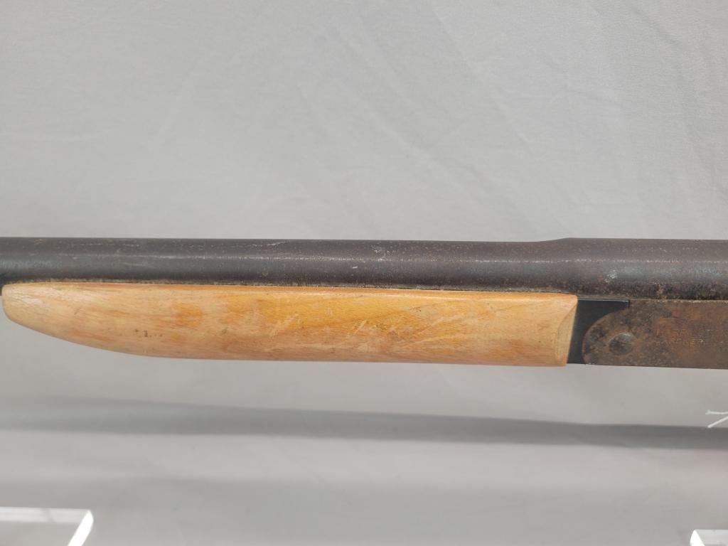 H&R Topper Shotgun H&R Topper single shot shotgun, chambered in 12 ga, wooden stock and blued barrel