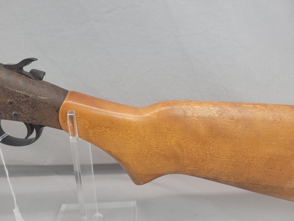 H&R Topper Shotgun H&R Topper single shot shotgun, chambered in 12 ga, wooden stock and blued barrel