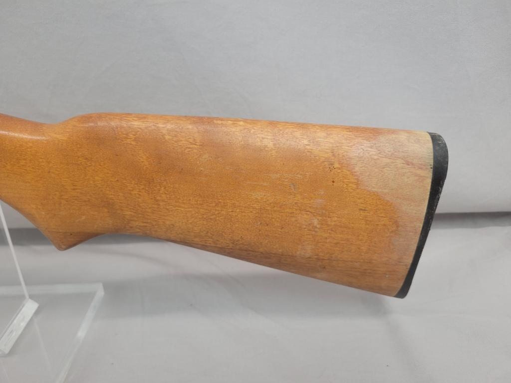 H&R Topper Shotgun H&R Topper single shot shotgun, chambered in 12 ga, wooden stock and blued barrel