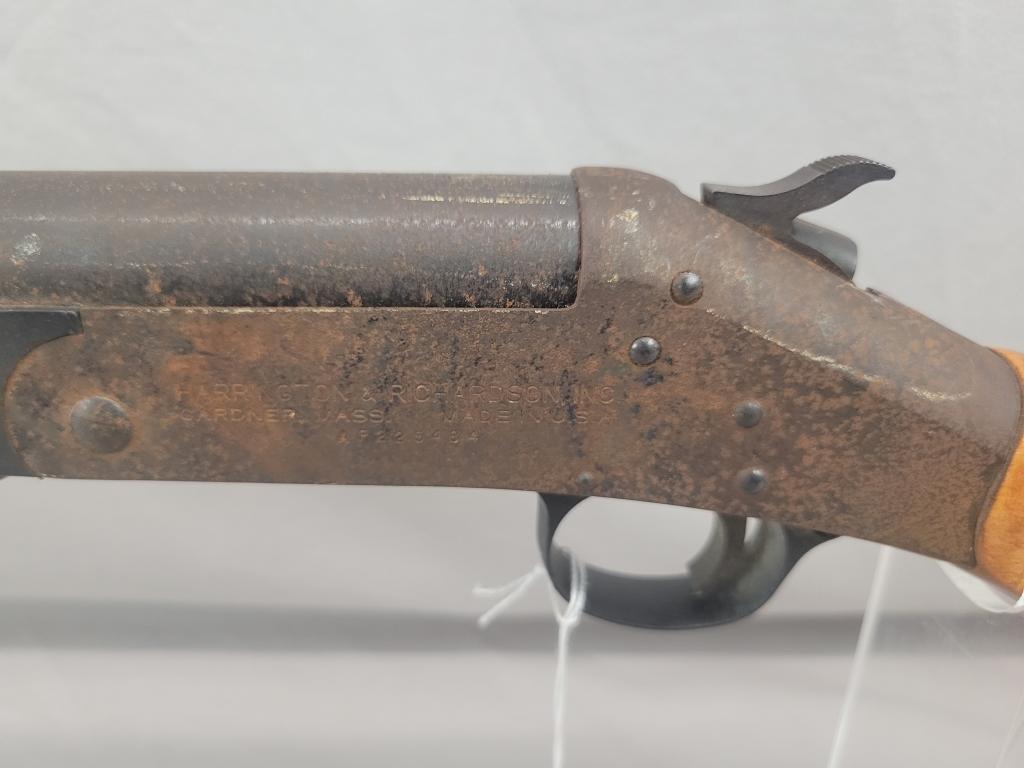 H&R Topper Shotgun H&R Topper single shot shotgun, chambered in 12 ga, wooden stock and blued barrel