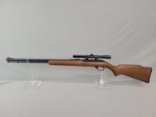 Glenfield/Marlin Model 60 .22 Cal Glenfield/Marlin Model 60 .22 LR. Wooden stock with blued barrel,