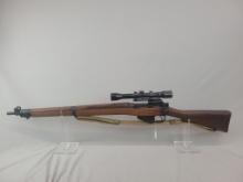 Enfield Rifle Enfield rifle, unknown manufacturer, chambered in .303. Wooden stock and blued barrel