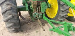 John Deere 620 LP tractor single front wheel