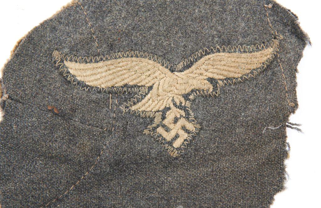 WWII GERMAN ARMY EAGLE & PATCH LOT OF 10