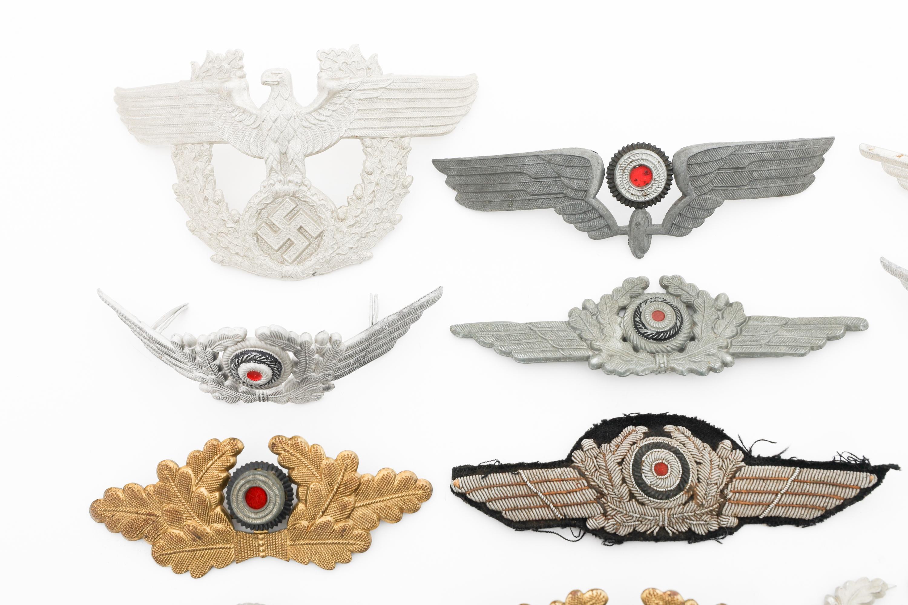 WWII GERMAN CAP BADGES & COCKADES