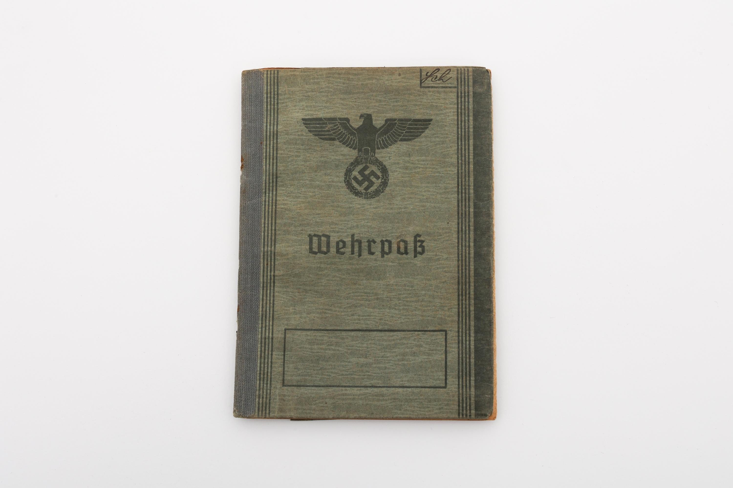 WWII GERMAN CIG BOOK, STAMPS, WEHRPASS & MAGAZINE