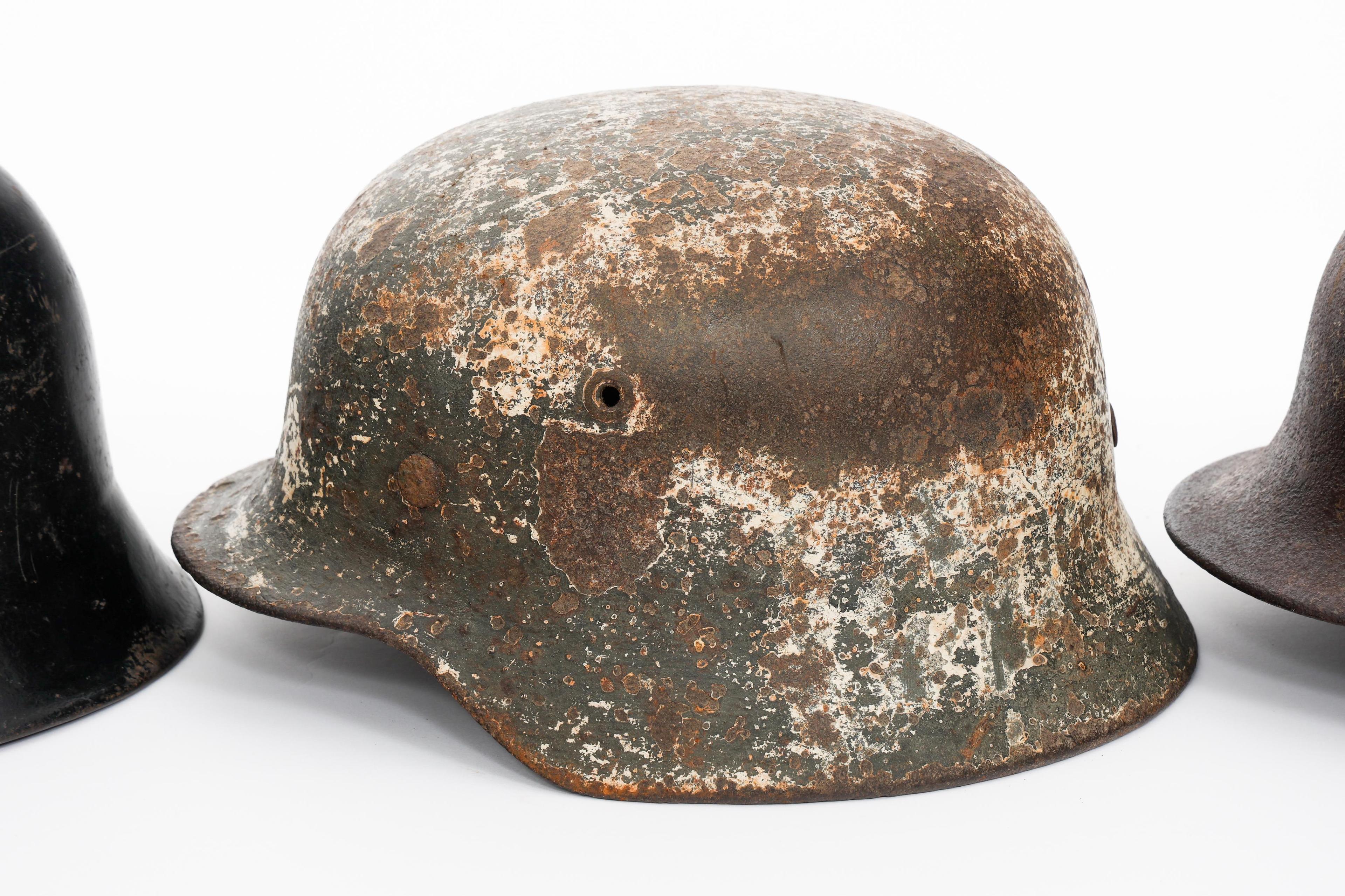 WWII GERMAN DUG RELIC FIREMAN & COMBAT HELMETS
