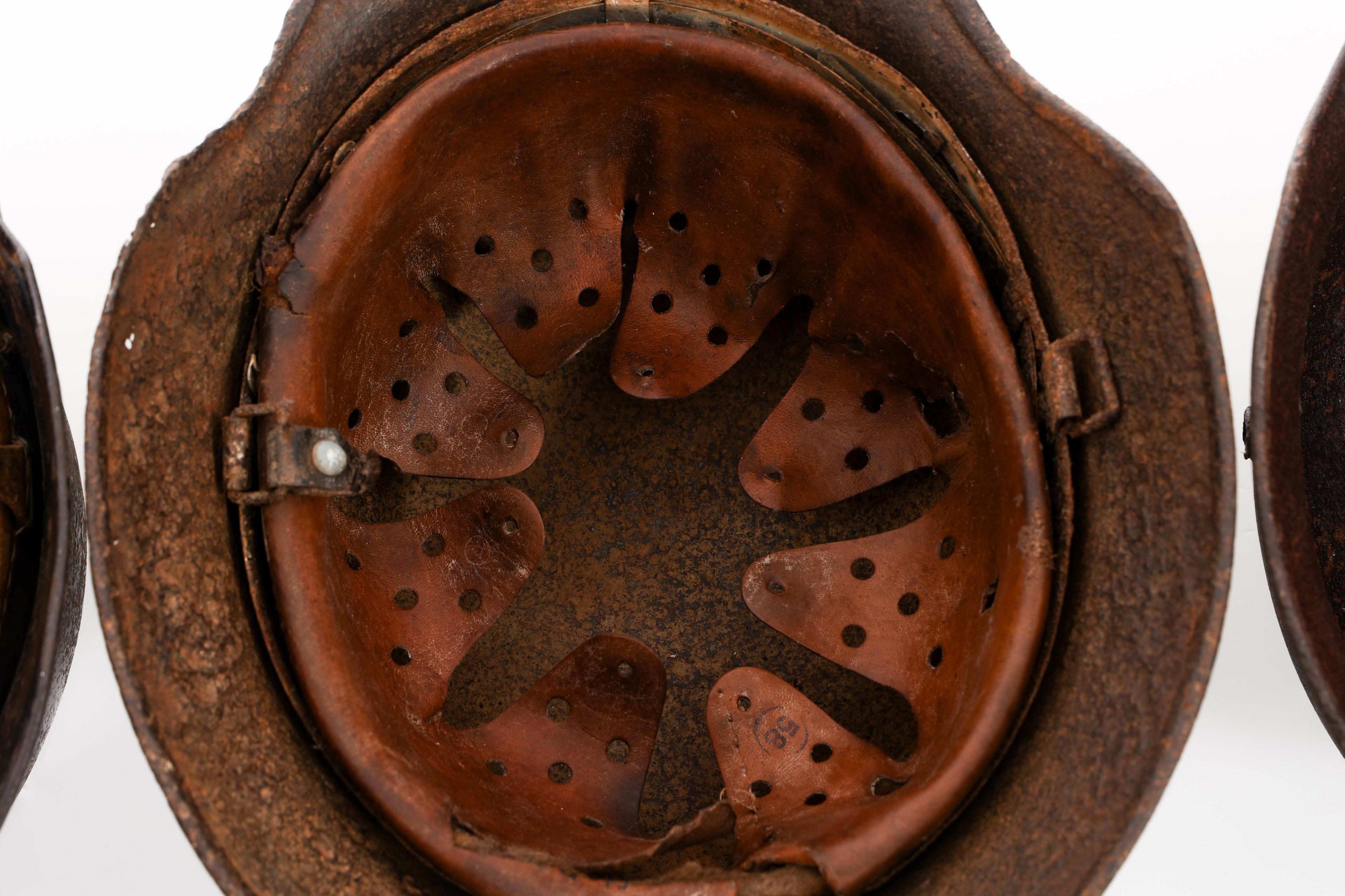 WWII GERMAN DUG RELIC FIREMAN & COMBAT HELMETS