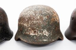 WWII GERMAN DUG RELIC FIREMAN & COMBAT HELMETS