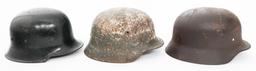WWII GERMAN DUG RELIC FIREMAN & COMBAT HELMETS