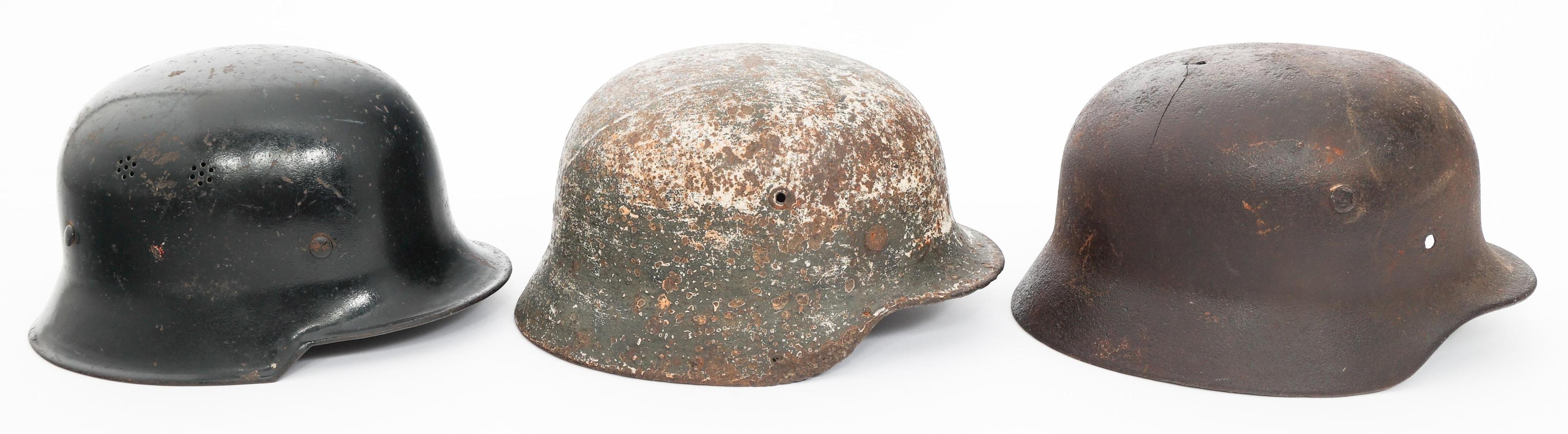WWII GERMAN DUG RELIC FIREMAN & COMBAT HELMETS