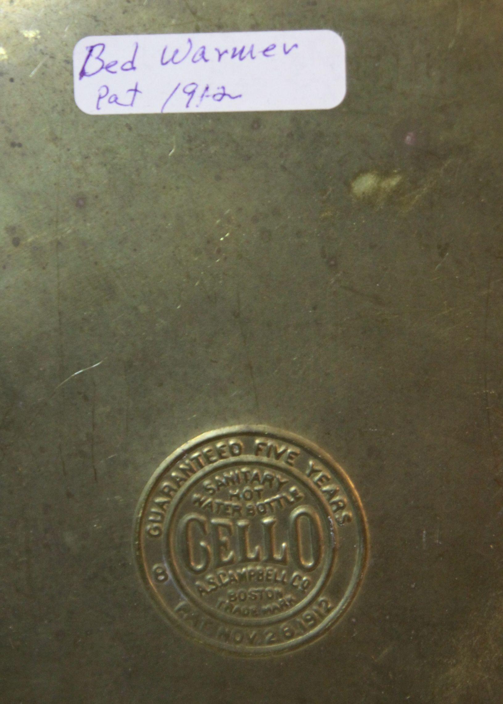 Brass bed warmer and wool covered canteen