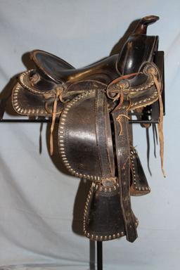 Youth saddle, studded