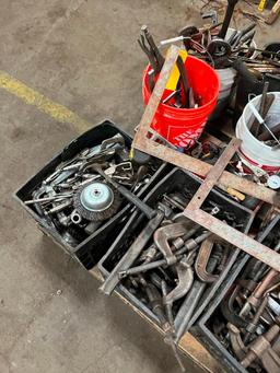 skid of assorted hand tools: C-clamps, vise grips, welding pliers, wrenches, tape measures, screw