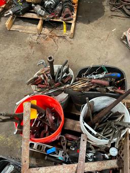 skid of assorted hand tools: C-clamps, vise grips, welding pliers, wrenches, tape measures, screw