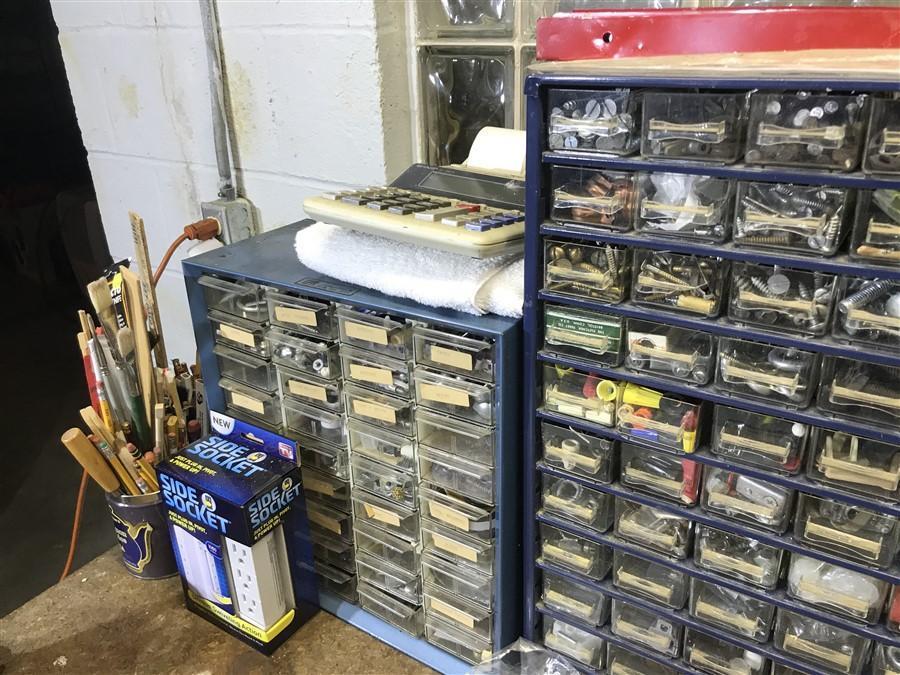 Items on top of workbench lot