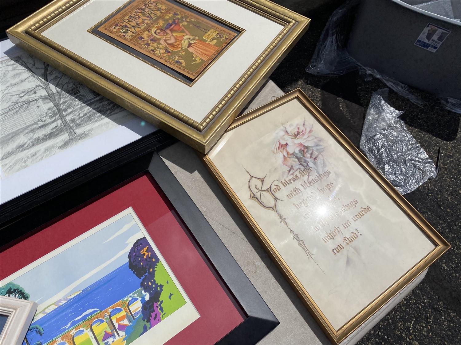 Table lot of assorted framed art, Coca Cola trays, paintings