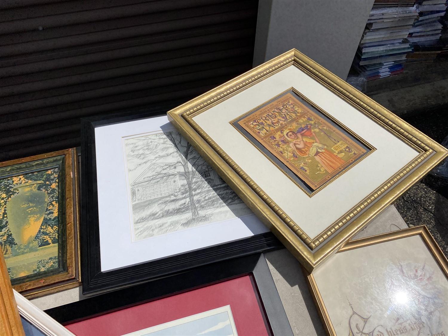 Table lot of assorted framed art, Coca Cola trays, paintings