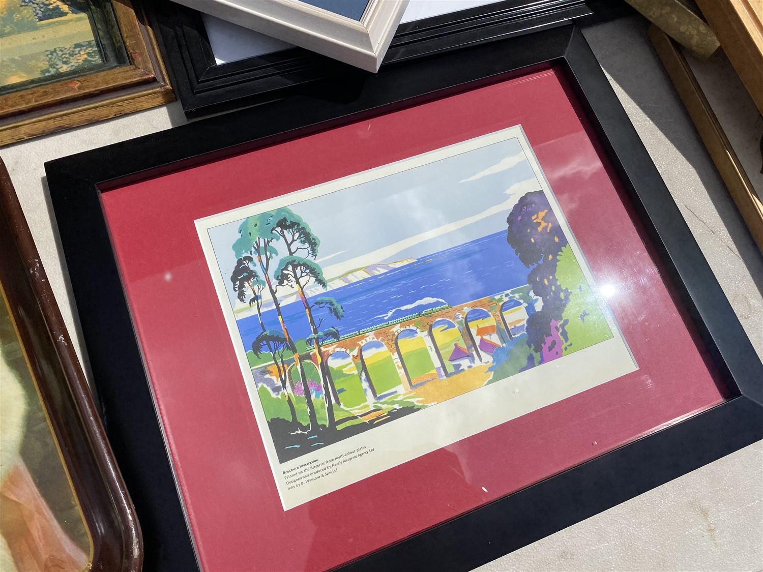 Table lot of assorted framed art, Coca Cola trays, paintings