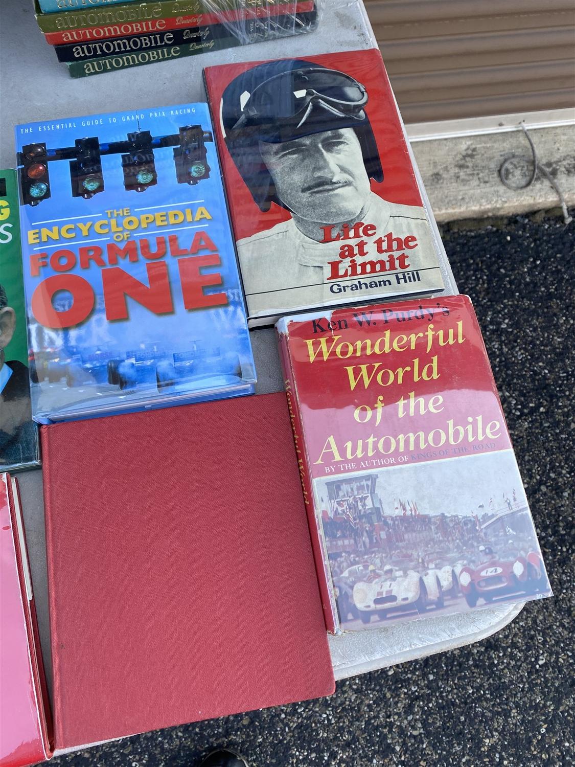 Group lot of vintage automobile racing books