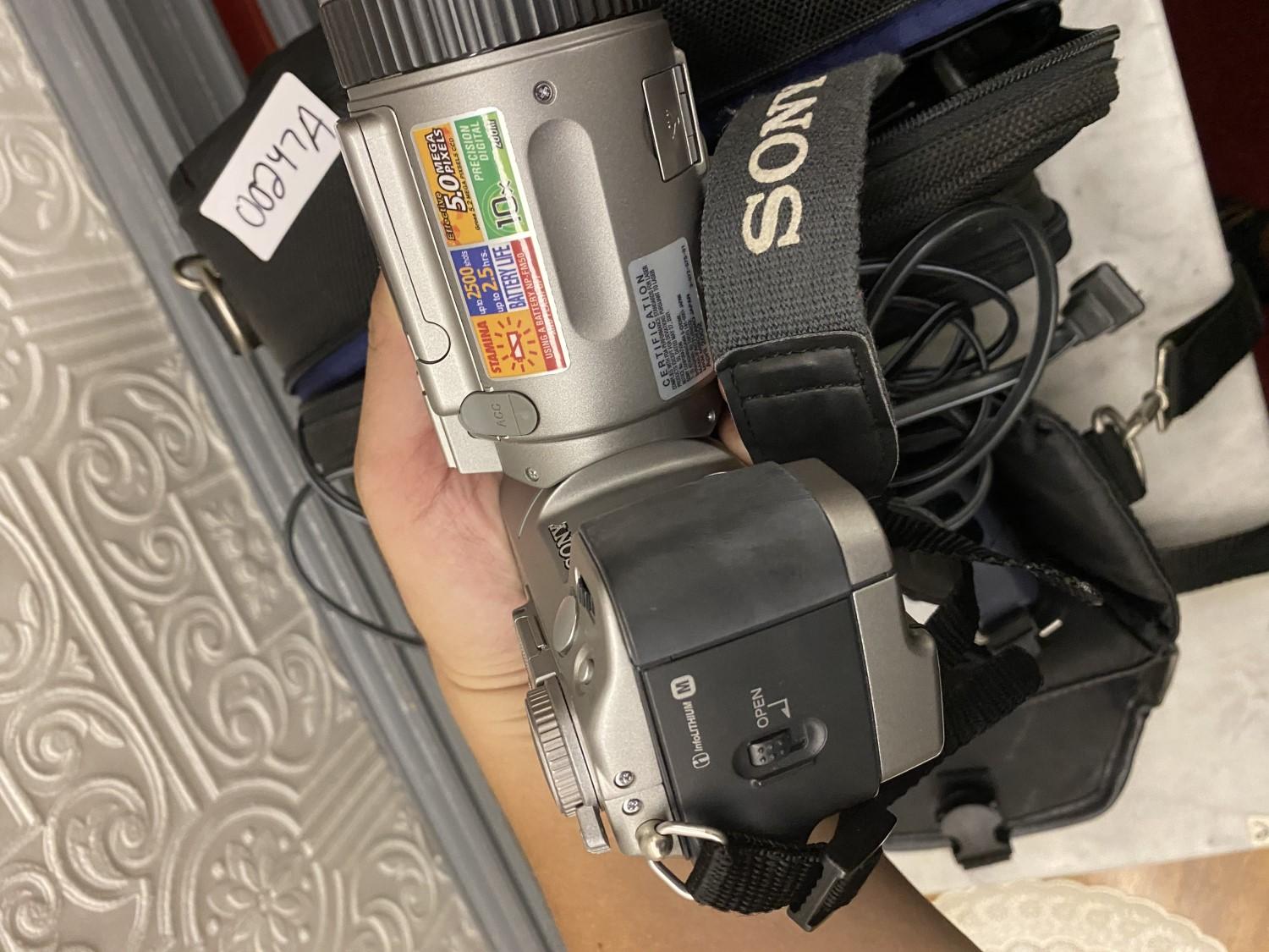 Two Cameras - SOny DSC-F707 and Digital 8 Handycam