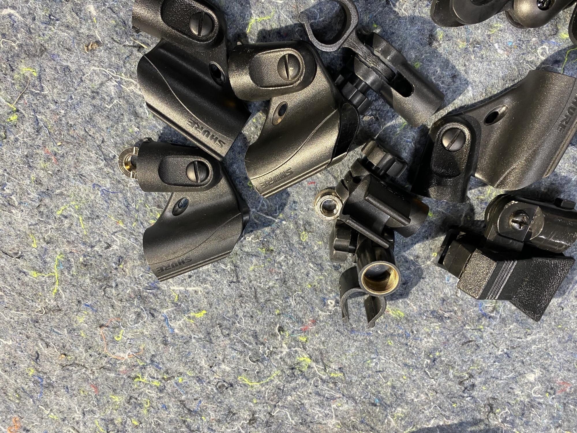 Group lot of Shure and other microphone mounts
