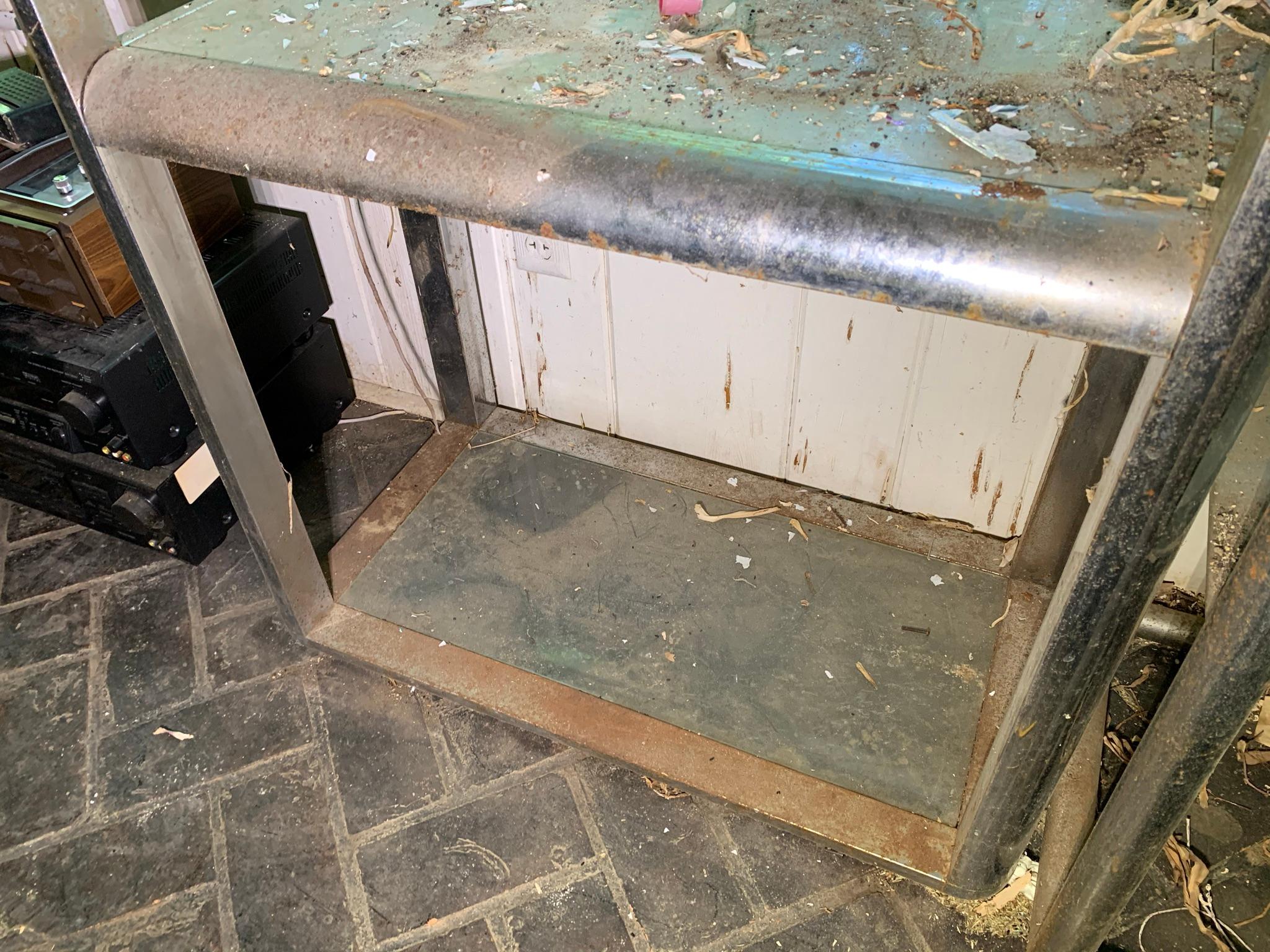 2 Chrome and Glass Shelving Units.  See Photos..