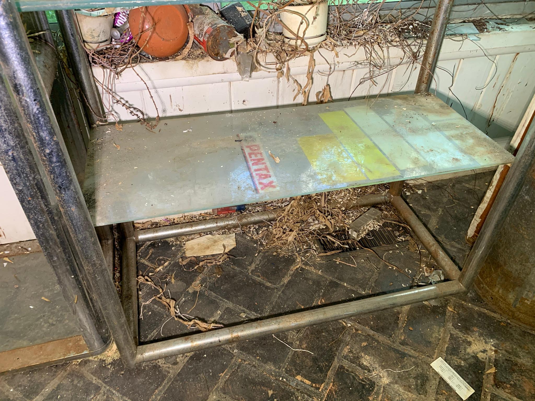 2 Chrome and Glass Shelving Units.  See Photos..